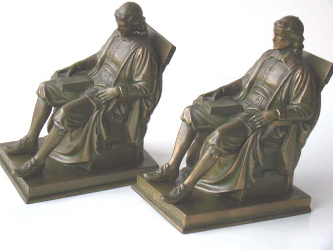 A pair of John Harvard Bookends circa 1915